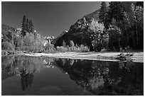 Banks of  Merced River with Half-Dome reflections in autumn. Yosemite National Park, California, USA. (black and white)