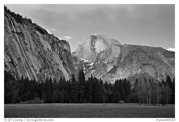 Seasonal waterfall and Half-Dome from Awhanhee Meadow. Yosemite National Park, California, USA.