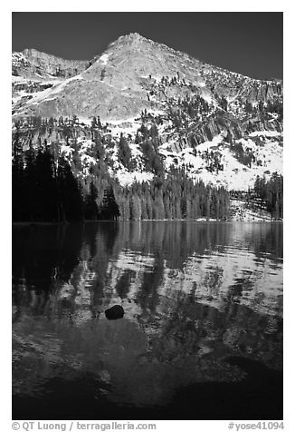 Tenaya Peak reflected in Tenaya Lake, early spring. Yosemite National Park (black and white)
