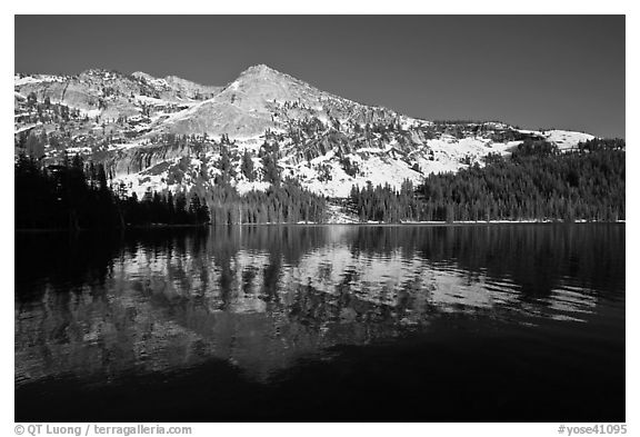 Tenaya Lake, with partly snow-covered peak reflected. Yosemite National Park (black and white)