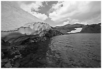 Gaylor lake in early summer with neve near water. Yosemite National Park ( black and white)