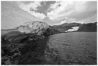 Gaylor lake in early summer with neve near water. Yosemite National Park ( black and white)