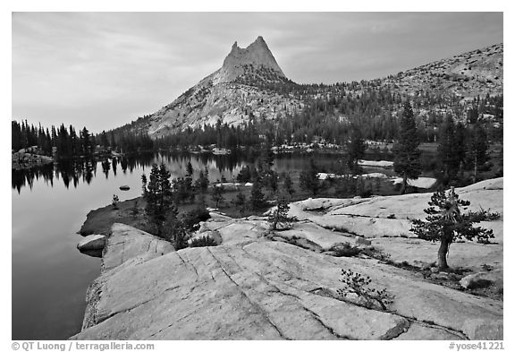 Granite slab, Upper Cathedral Lake, and Cathedral Peak, sunset. Yosemite National Park (black and white)