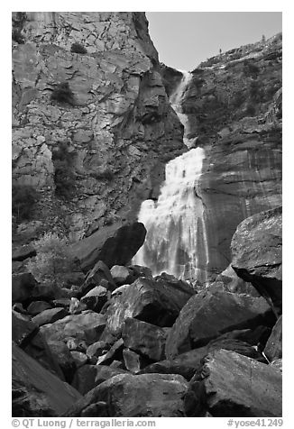 Boulders, Wapama Falls, and rock wall, Hetch Hetchy. Yosemite National Park, California, USA.