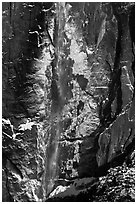 Upper Yosemite Falls and icy rock wall. Yosemite National Park ( black and white)
