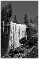 Hikers standing on Mist Trail below Vernal Fall. Yosemite National Park, California, USA. (black and white)