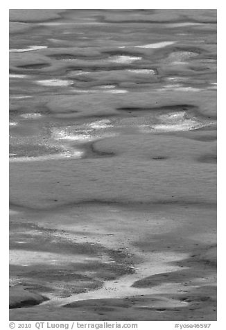 Melting snow pattern on lake. Yosemite National Park (black and white)