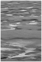 Melting snow pattern on lake. Yosemite National Park, California, USA. (black and white)