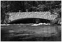 Pohono Bridge with high waters. Yosemite National Park, California, USA. (black and white)