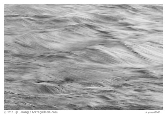 Water reflecting cliff colors. Yosemite National Park (black and white)