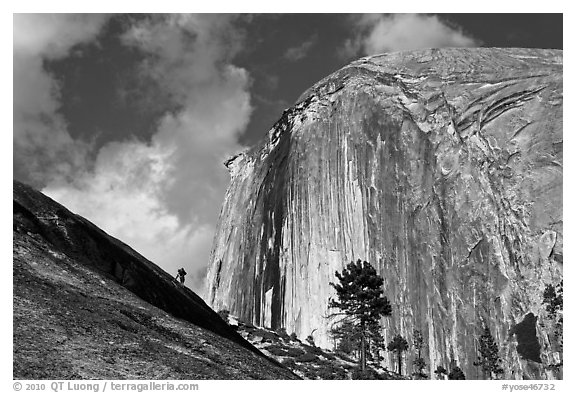 Hiker near Diving Board and Half-Dome. Yosemite National Park (black and white)