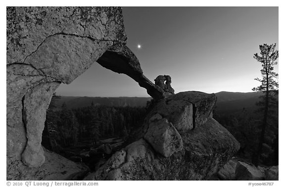 Indian Arch and moon at dusk. Yosemite National Park, California, USA.