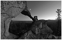 Indian Arch and moon at dusk. Yosemite National Park, California, USA. (black and white)