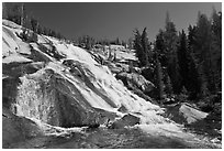 Stream flowing over steep smooth granite, Lewis Creek. Yosemite National Park, California, USA. (black and white)