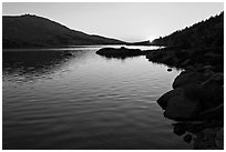 Sun setting over Upper McCabe Lake. Yosemite National Park, California, USA. (black and white)