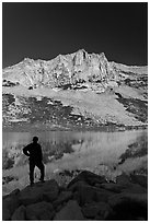 Hiker standing  on Roosevelt lakeshore. Yosemite National Park ( black and white)