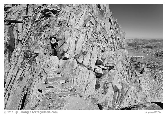 Hiker on summit block of Mount Conness. Yosemite National Park (black and white)