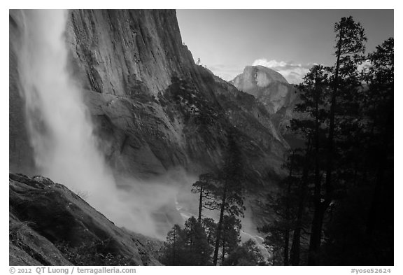 Upper Yosemite Falls and Half-Dome at sunset. Yosemite National Park, California, USA.