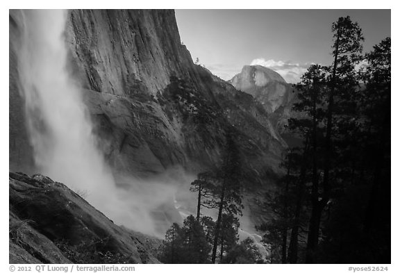 Upper Yosemite Falls and Half-Dome at sunset. Yosemite National Park, California, USA.