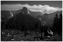 Half-Dome and plume of smoke from wildfire at night. Yosemite National Park ( black and white)