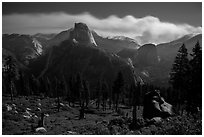 Half-Dome and plume of smoke from wildfire at night. Yosemite National Park ( black and white)