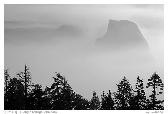 Half-Dome and Clouds Rest emerging from smoke. Yosemite National Park (black and white)