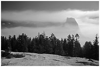 Half-Dome with fog clearing from Sentinel Dome. Yosemite National Park ( black and white)