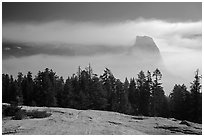 Half-Dome with fog clearing from Sentinel Dome. Yosemite National Park ( black and white)