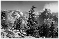 Visitor looking, Half-Dome from Glacier Point. Yosemite National Park ( black and white)