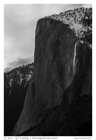 El Capitan with Horsetail Fall natural firefall. Yosemite National Park (black and white)