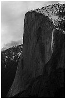 El Capitan with Horsetail Fall natural firefall. Yosemite National Park ( black and white)
