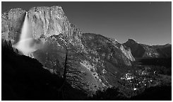 Upper Yosemite Fall with moonbow, Yosemite Village, and Half-Dome. Yosemite National Park, California, USA. (black and white)