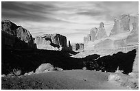 South park avenue, an open canyon flanked by sandstone skycrapers. Arches National Park, Utah, USA. (black and white)