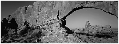 Arch through natural window opening. Arches National Park (Panoramic black and white)