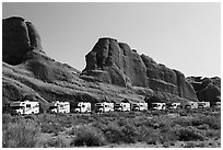 RVs parked at Devils Garden trailhead. Arches National Park, Utah, USA. (black and white)