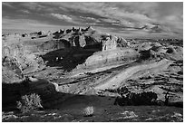 Entrada Sandstone basin with Delicate Arch in distance. Arches National Park, Utah, USA. (black and white)