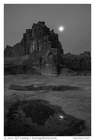 Courthouse tower and moon at night. Arches National Park (black and white)