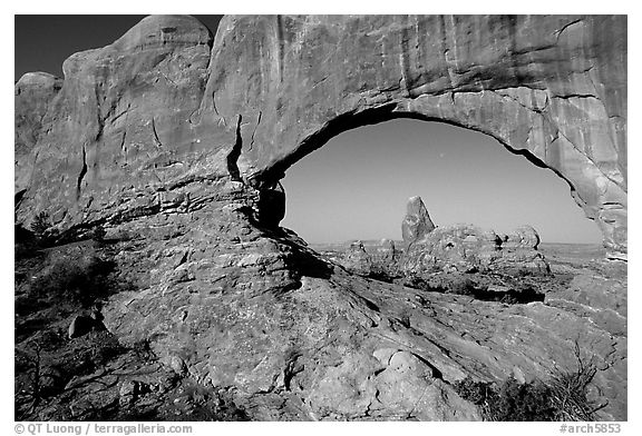 Turret Arch seen through South Window, early morning. Arches National Park, Utah, USA.