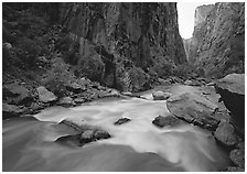 Gunisson River flowing beneath steep canyon walls. Black Canyon of the Gunnison National Park, Colorado, USA. (black and white)