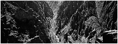 Gunnisson River running deep in narrow gorge. Black Canyon of the Gunnison National Park (Panoramic black and white)