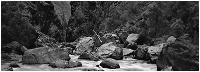 Gunnisson River and boulders in gorge. Black Canyon of the Gunnison National Park (Panoramic black and white)