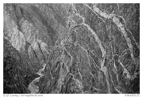 Sheer cliff with flourishes of crystalline pegmatite. Black Canyon of the Gunnison National Park (black and white)