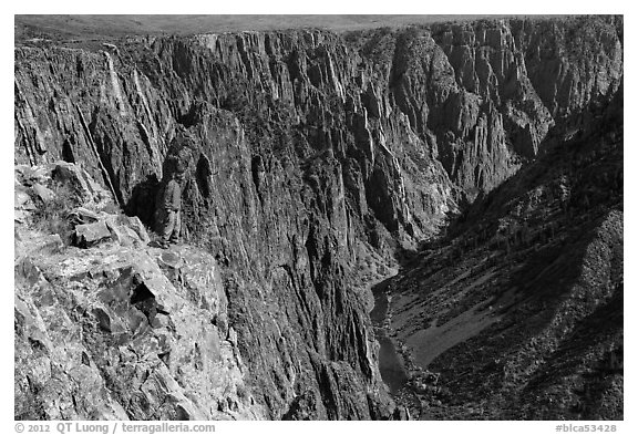 Park visitor looking, Pulpit rock overlook. Black Canyon of the Gunnison National Park, Colorado, USA.