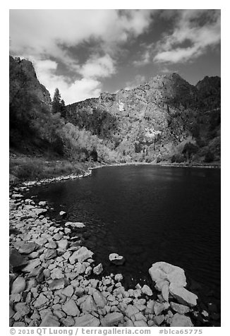 Gunnison River shore and cliffs at East Portal in the fall. Black Canyon of the Gunnison National Park (black and white)