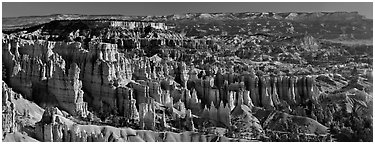 Densely aligned pinnacles in horseshoe-shaped amphitheaters along edge of Pausaugunt Plateau. Bryce Canyon National Park (Panoramic black and white)