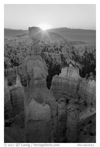 Sun rising behind Thor Hammer. Bryce Canyon National Park, Utah, USA.