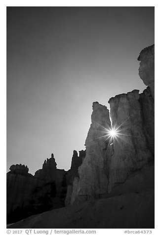 Sun star between hoodoos. Bryce Canyon National Park (black and white)