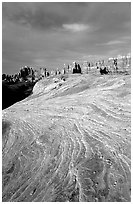 Sandstone striations and Needles near Elephant Hill, sunrise. Canyonlands National Park ( black and white)