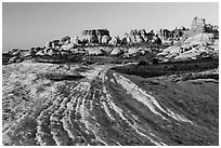 Sandstone swirls and Doll House spires, early morning. Canyonlands National Park, Utah, USA. (black and white)