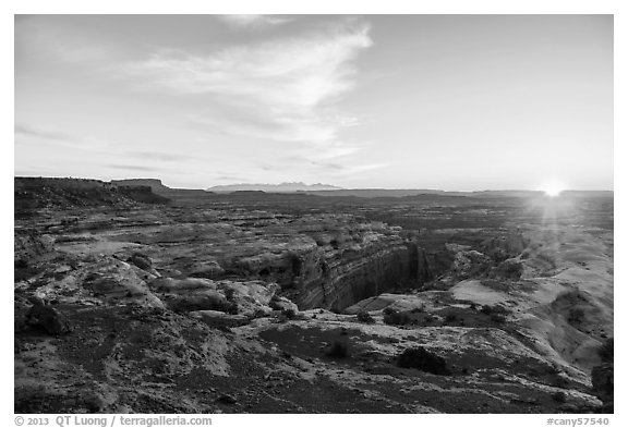 Sunrise over Jasper Canyon from Petes Mesa. Canyonlands National Park, Utah, USA.